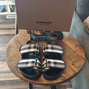 Men size 9 women size 11. Burberry sandals.